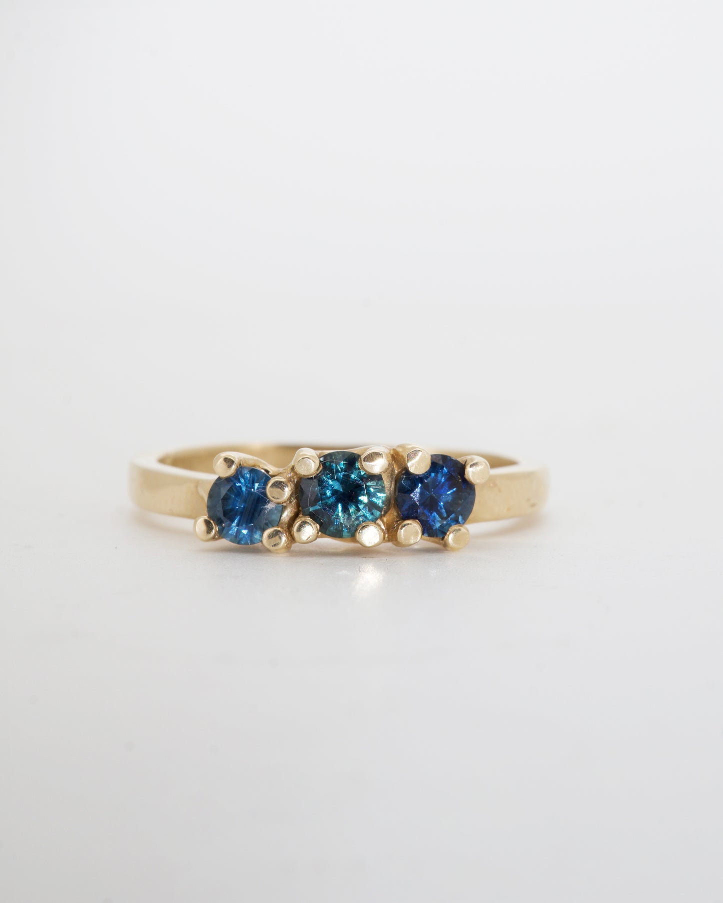 Teal Sapphires & 9ct Yellow Gold