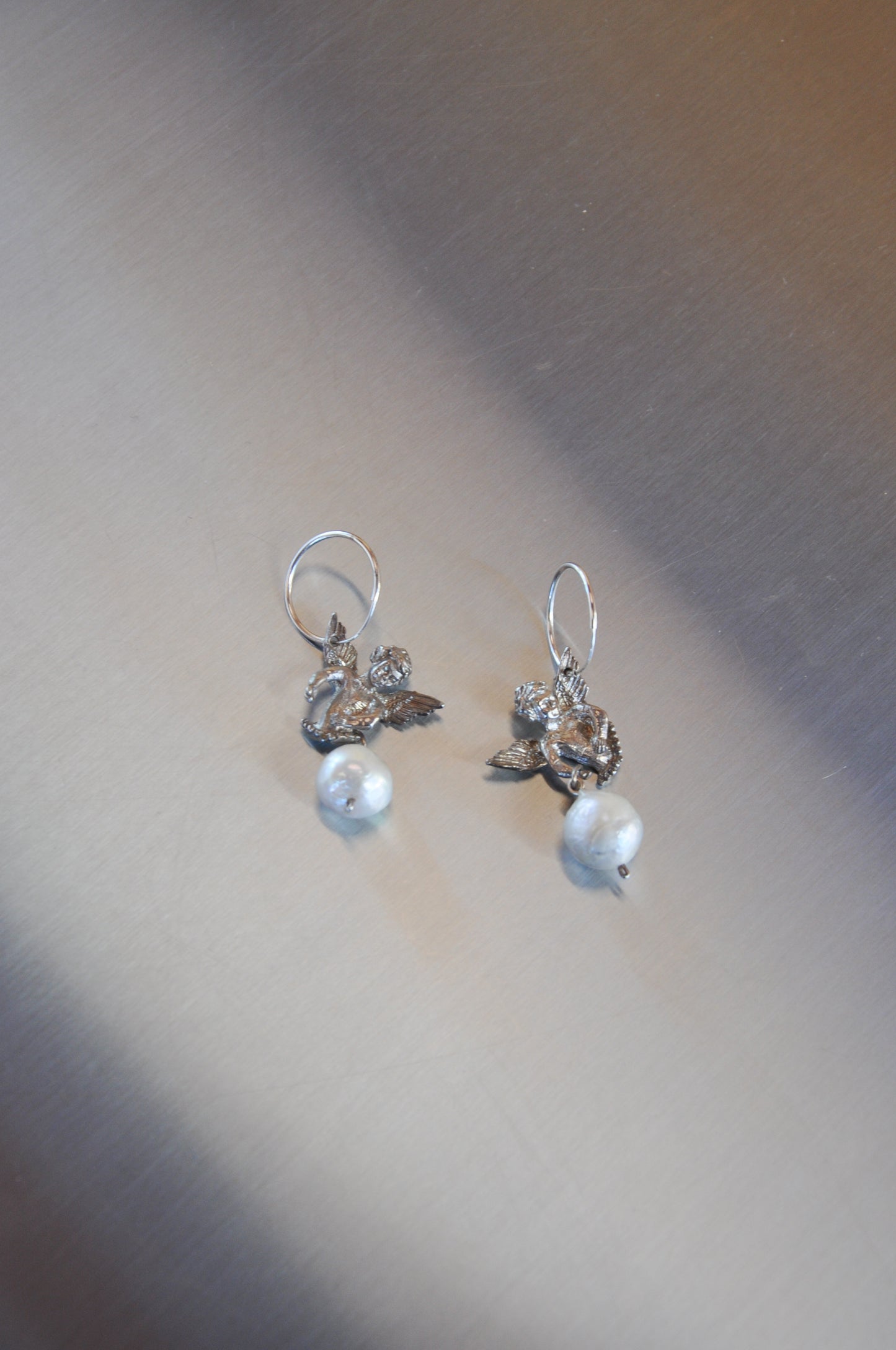 Sacreflux cherub pearl hoops in sterling silver