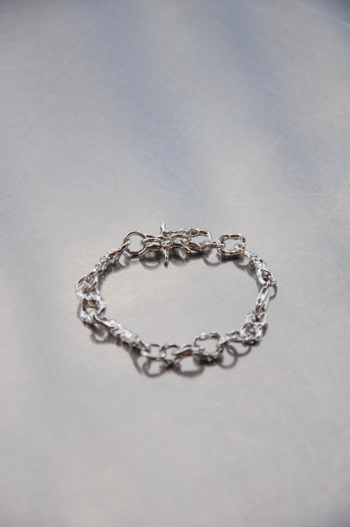 Sculpted Link Star Charm Bracelet