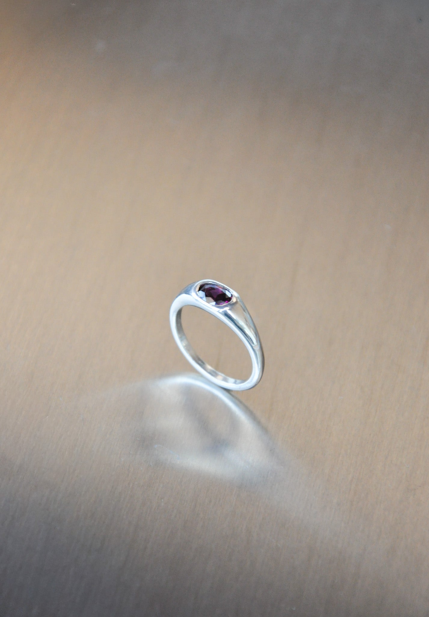 Orbit Ring Silver & Rhodolite Garnet