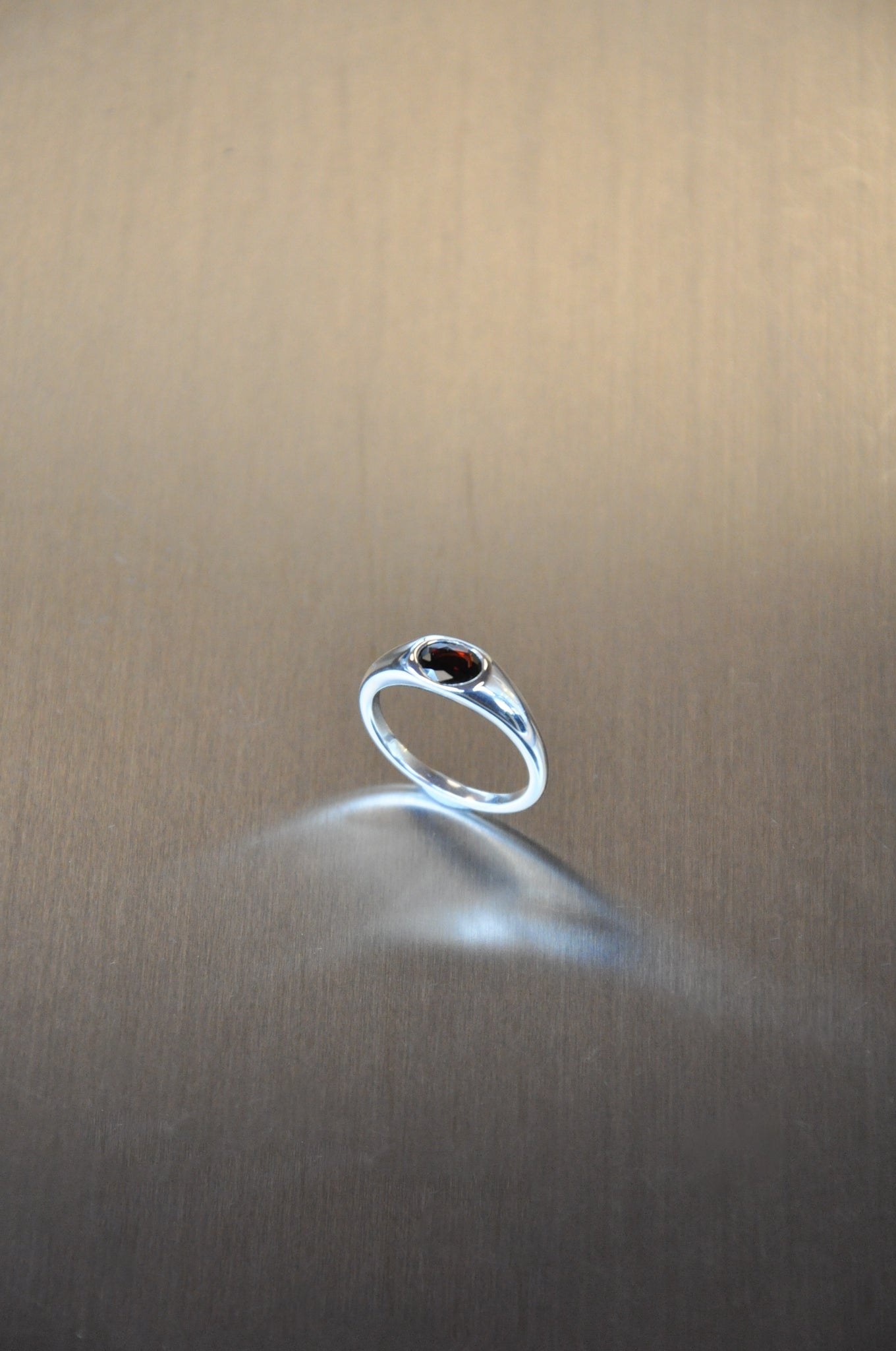 Orbit Ring in Silver & Garnet