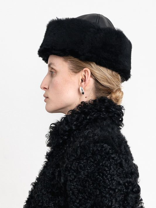 Suede Back Curly Sheepskin Cap in Black