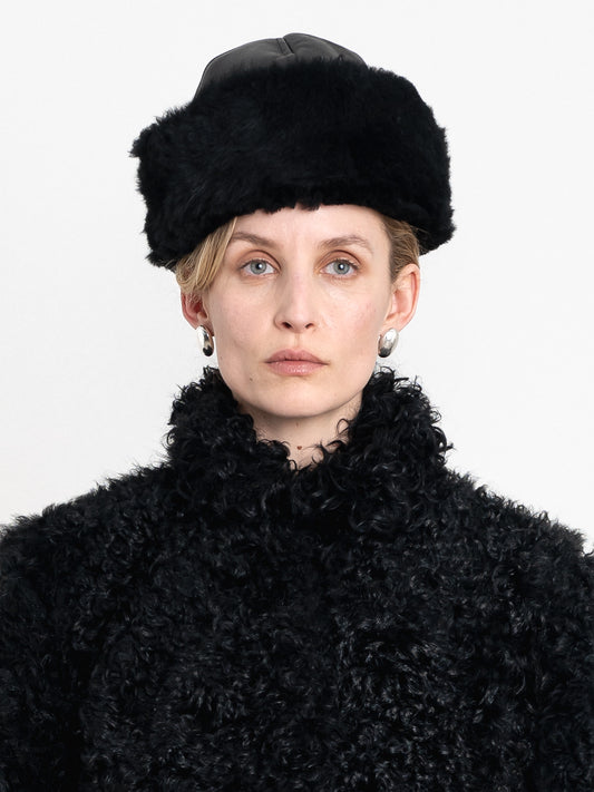 Suede Back Curly Sheepskin Cap in Black